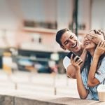 International dating symbolized by a happy foreign couple