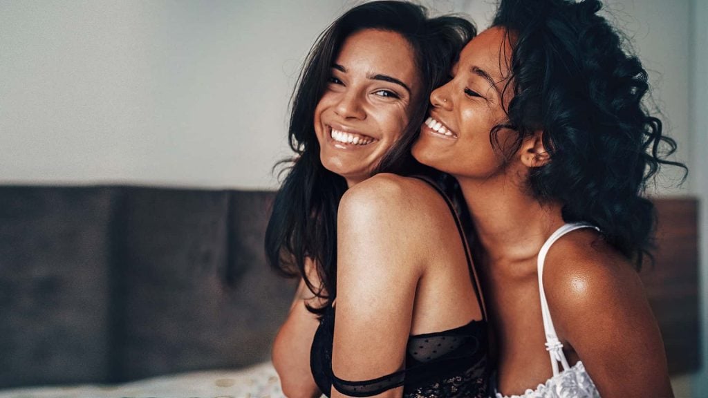 Lesbian dating illustrated by two girls who embrace each other