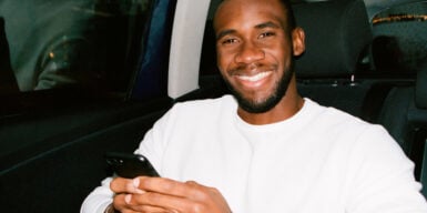 Man on the phone considers whether he should call her