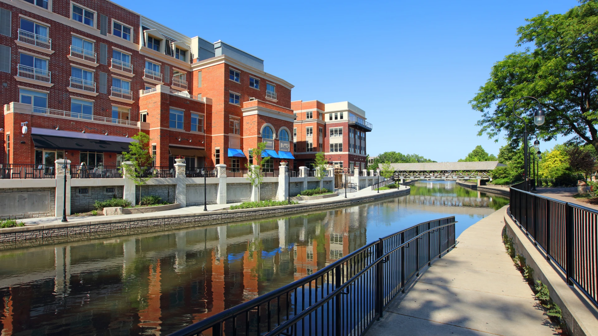 Buildings in Naperville next to a river.