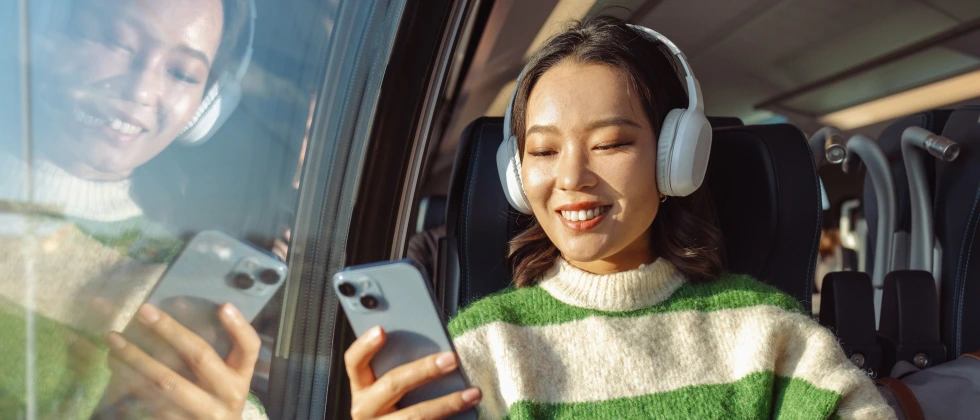 Women in a train thinks of how when should you ask someone out on a dating app